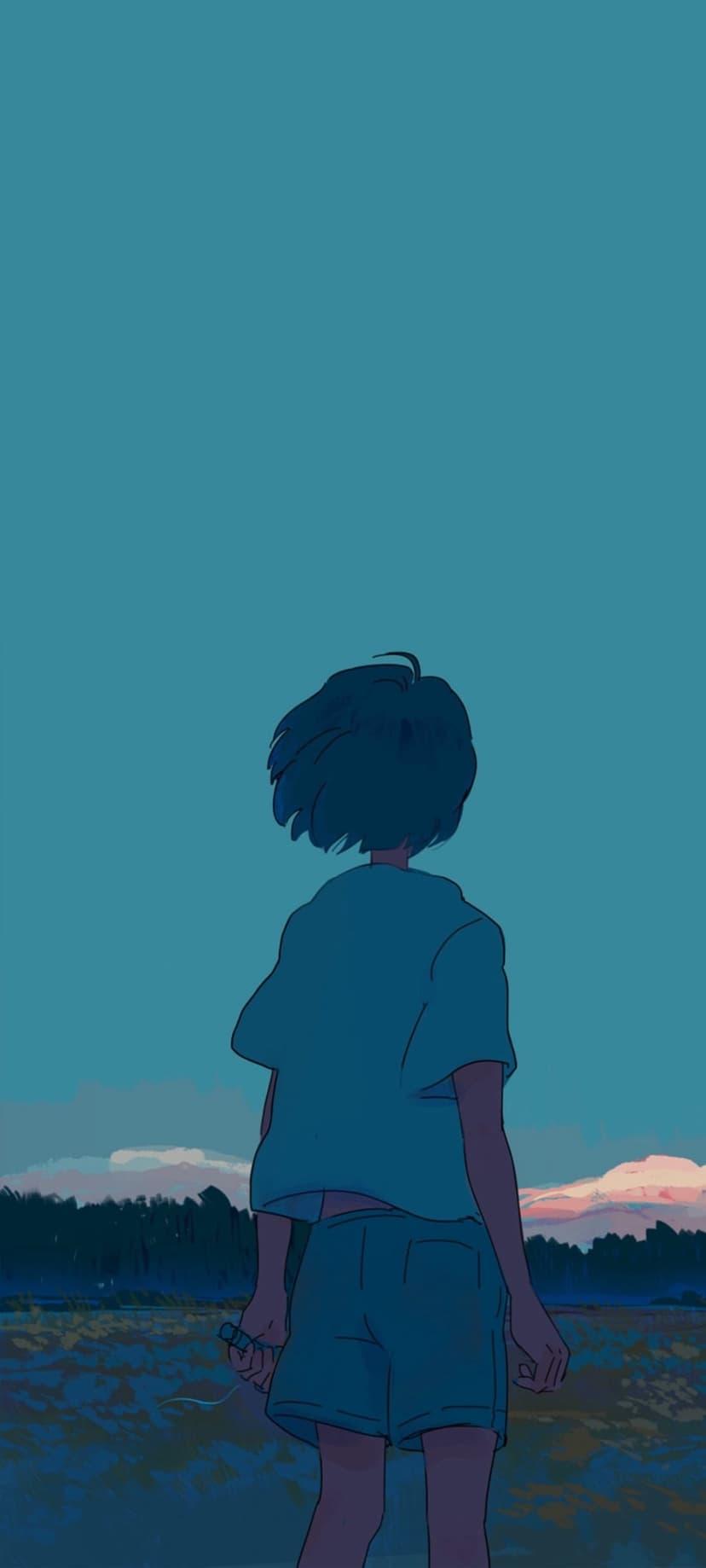 Girl with short dark hair seen from behind stands in a grassy field looking at a pink and orange sunset sky.