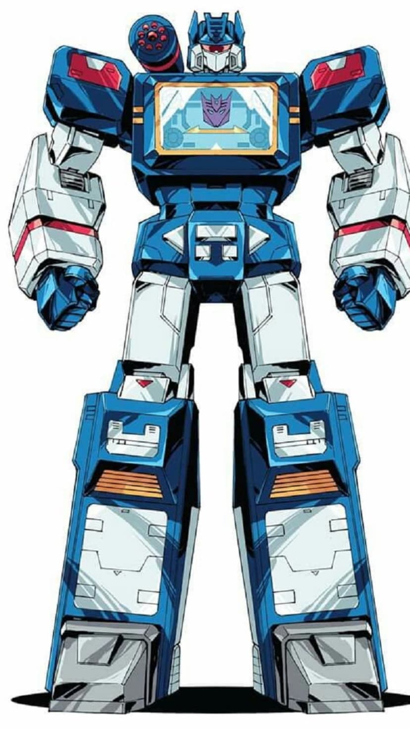 Soundwave robot with blue and white armor plates stands upright featuring a purple Decepticon chest insignia.