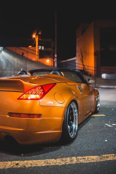 Orange Convertible Sports Car at Night