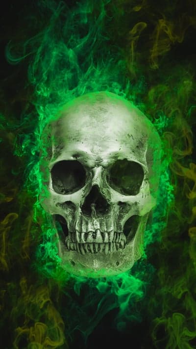 Eerie Skull Surrounded by Glowing Green Smoke