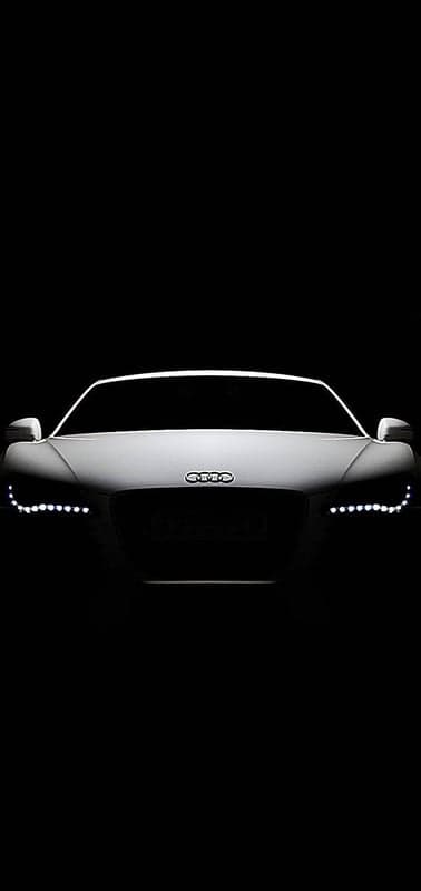 Dramatic Audi R8 Headlights on Black Background