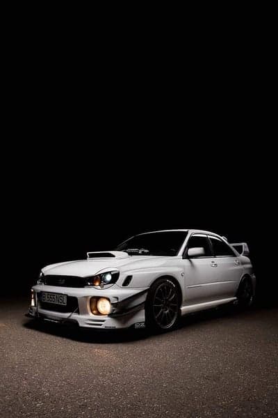 White Subaru WRX STI Night Performance Mobile Wallpaper