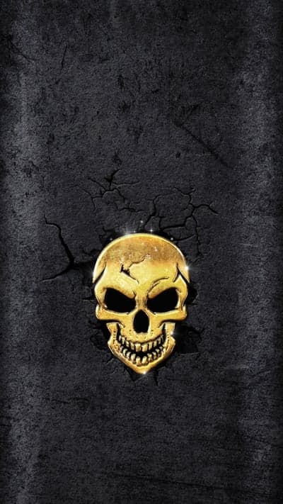 Gilded Human Skull with Cracked Dark Texture Wallpaper