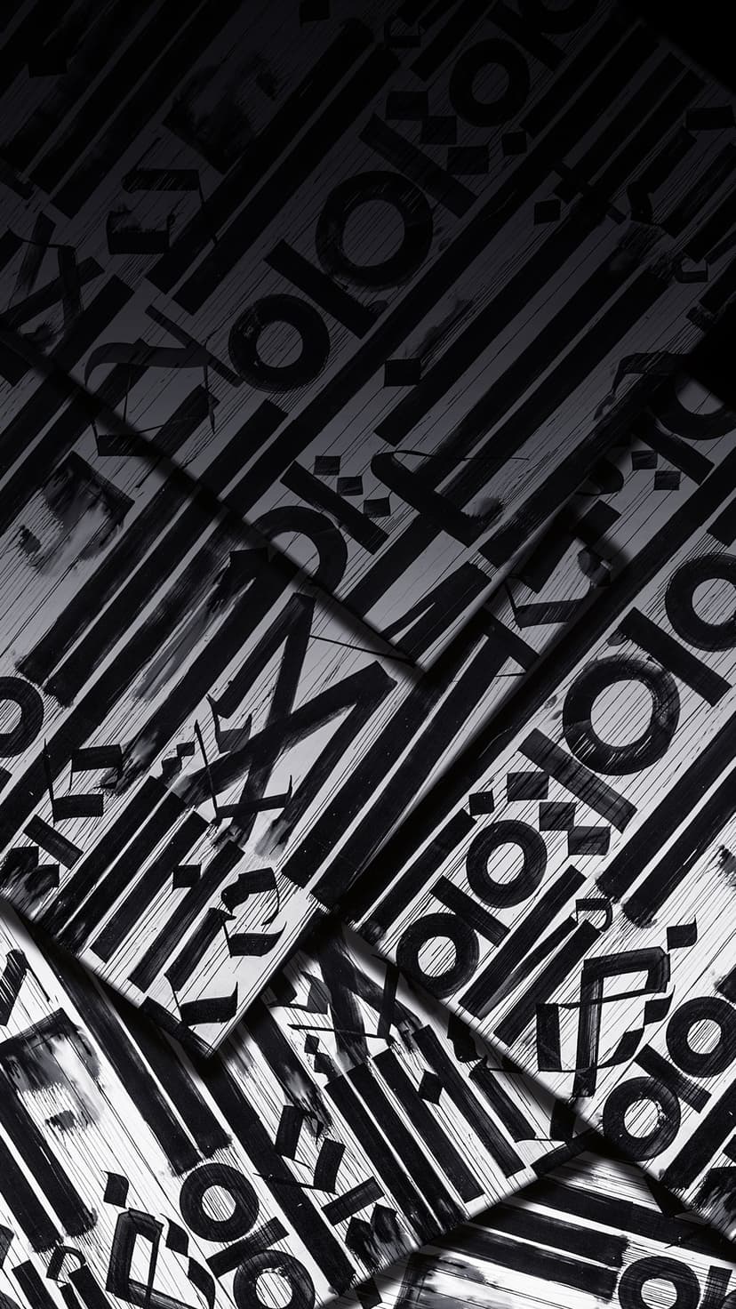 Overlapping black typography and diagonal geometric shapes contrast against a grainy white textured surface.