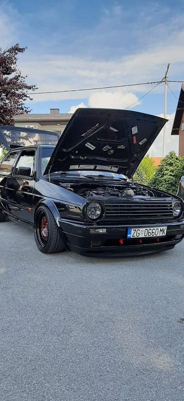 Black Volkswagen Golf Mk2 with Open Hood and Engine