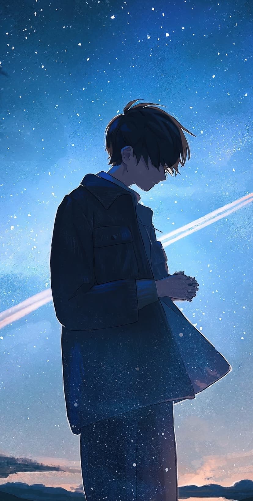 Dark-haired boy in a jacket gazes down against a deep blue night sky filled with stars and glowing light streaks.