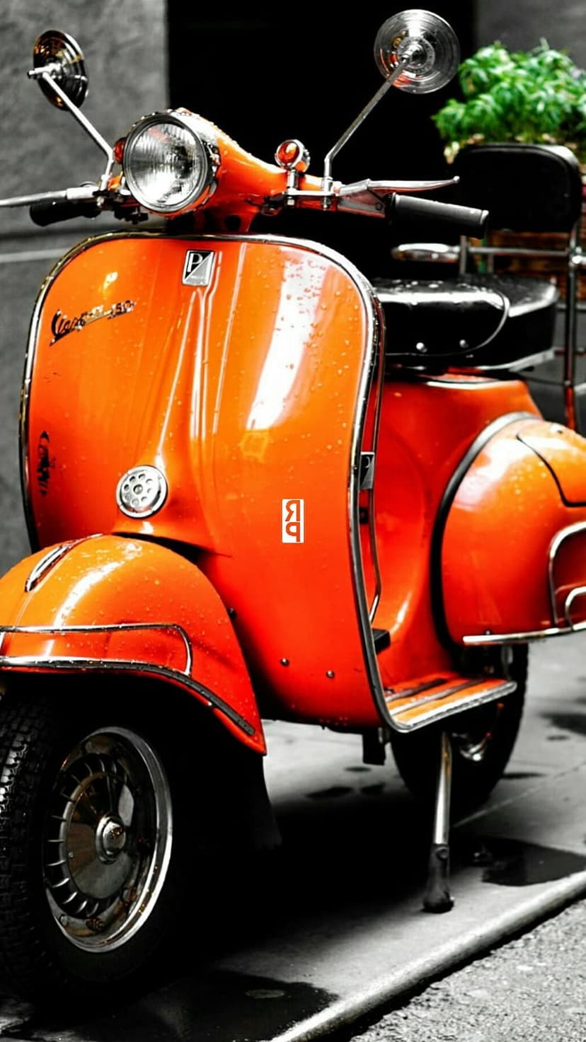 Orange vintage Vespa scooter with chrome mirrors reflects on wet ground during a vertical portrait close-up shot.