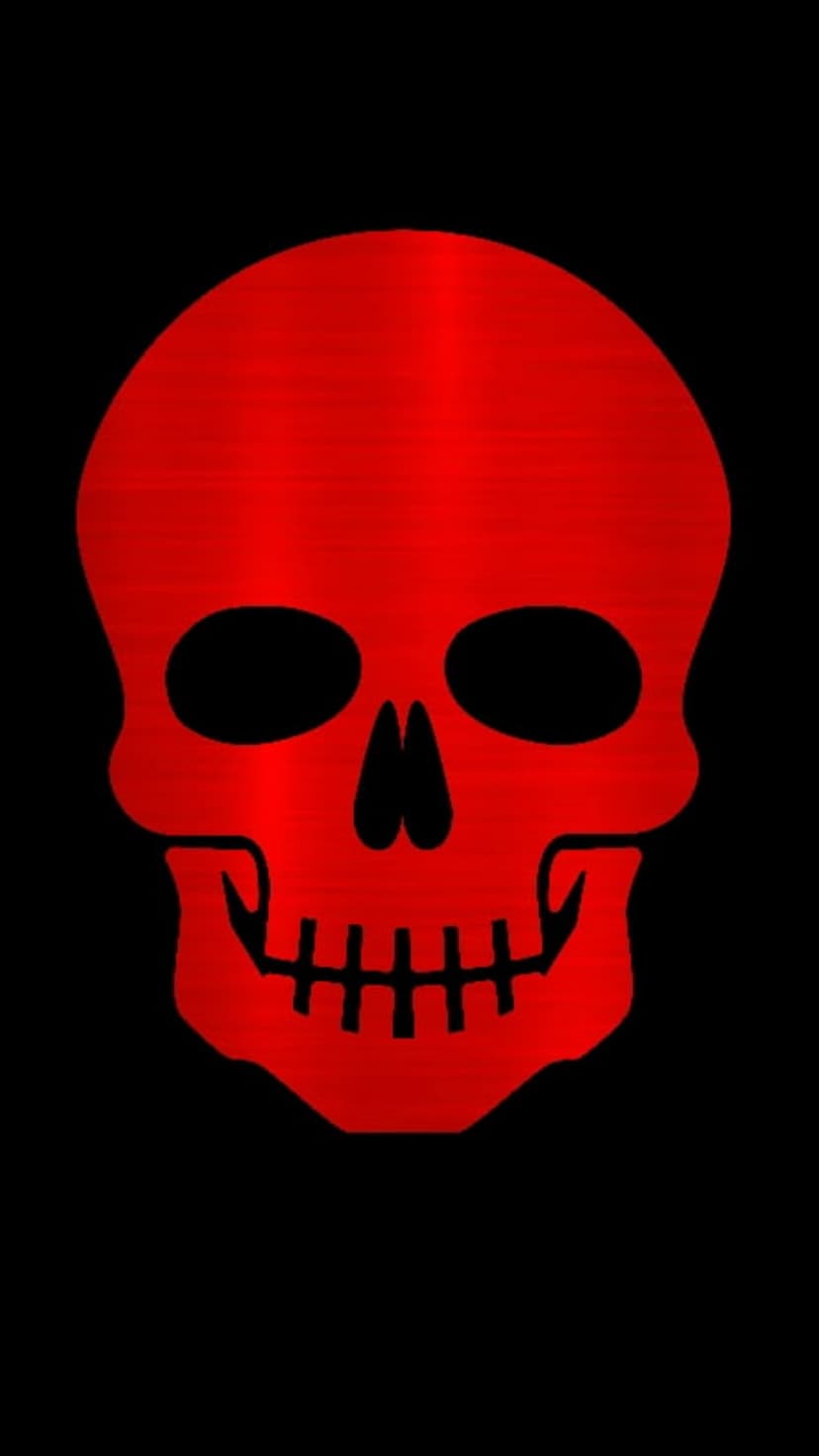 Red metallic skull with deep black eye sockets and a grinning mouth centered on a solid dark background.