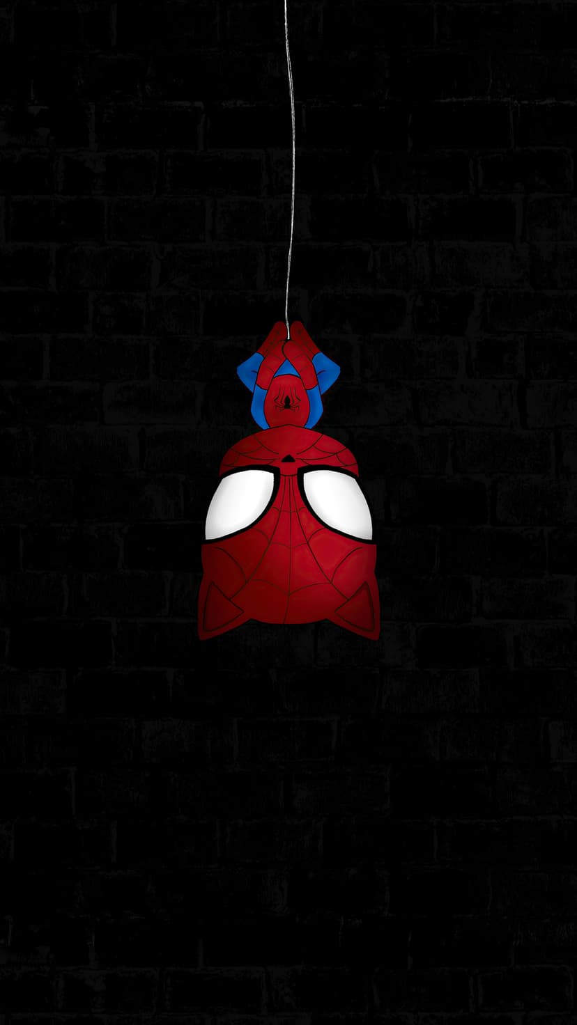 Spiderman mask hanging upside down by a web against a dark brick wall with large white eye lenses visible.