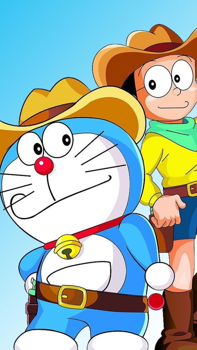 Doraemon and Nobita wearing cowboy hats and western gear against a clear blue sky in a vertical composition.