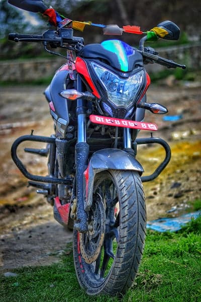 Red and Black Sport Bike with Prayer Flags
