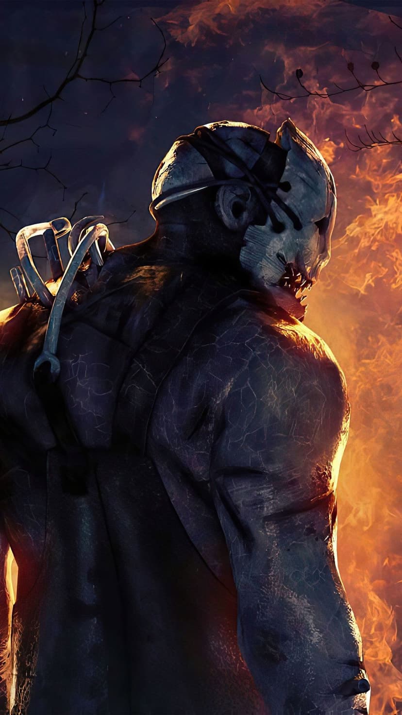Masked Trapper character from Dead by Daylight stands before orange flames with bear traps on his shoulder.