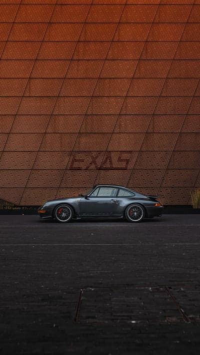 Vintage Grey Porsche 911 Phone Wallpaper Urban Backdrop