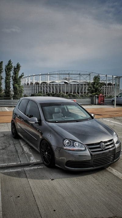 Customized Grey Volkswagen Golf GTI parked outdoors