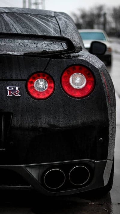 Nissan GT-R Rear Emblem and Tail Lights Rain Wallpaper