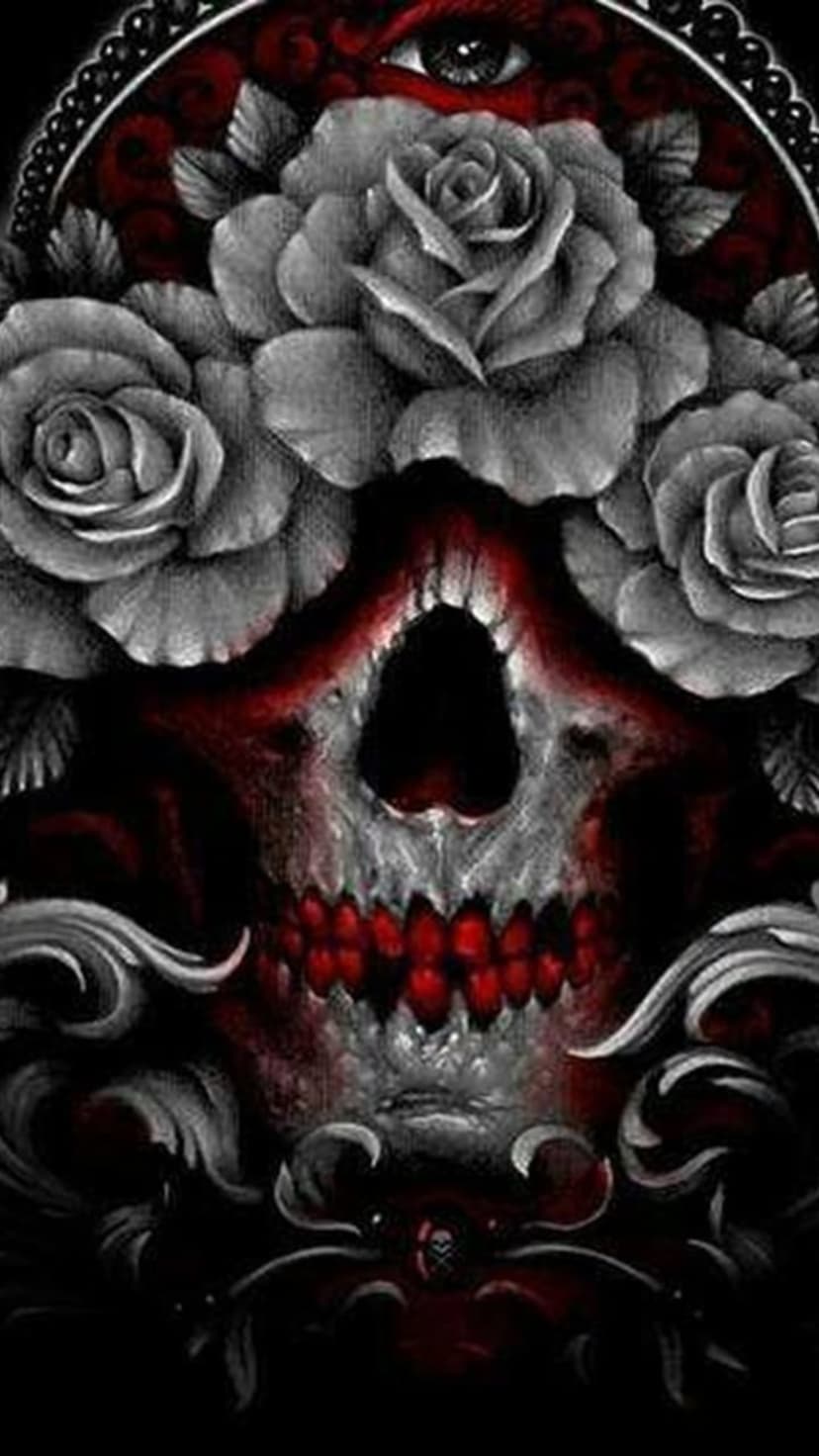 Grinning gothic skull with red teeth and eyes surrounded by gray roses and dark ornamental swirling patterns.