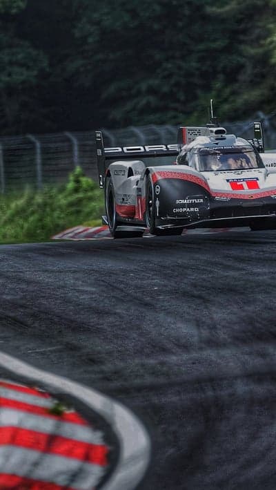 Porsche Le Mans Racing Car High-Speed Mobile Wallpaper