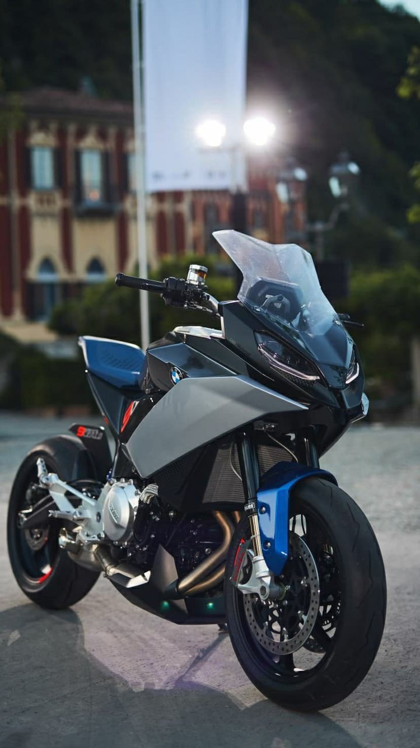 BMW R18 Transcontinental motorcycle in dark grey with silver accents, featuring a large exposed boxer engine.