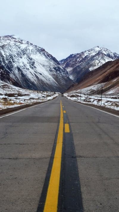 Mountain Road Ahead - Snowy Peaks Vista