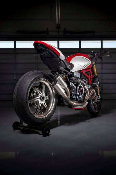 Striking Red and White Ducati Motorcycle in a Garage