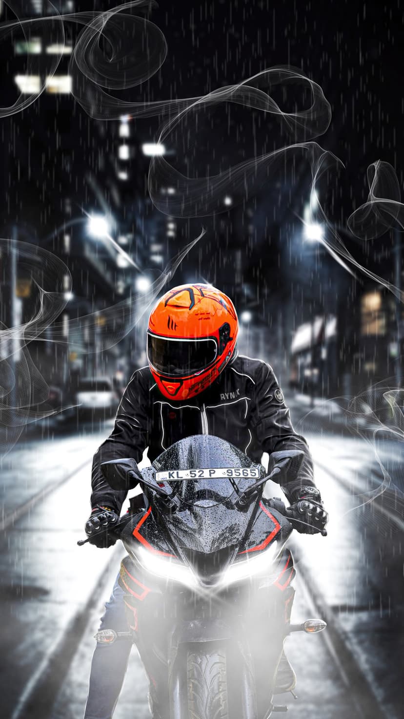 Motorcyclist in an orange helmet riding a bike on a rainy night street with glowing headlights and city bokeh.