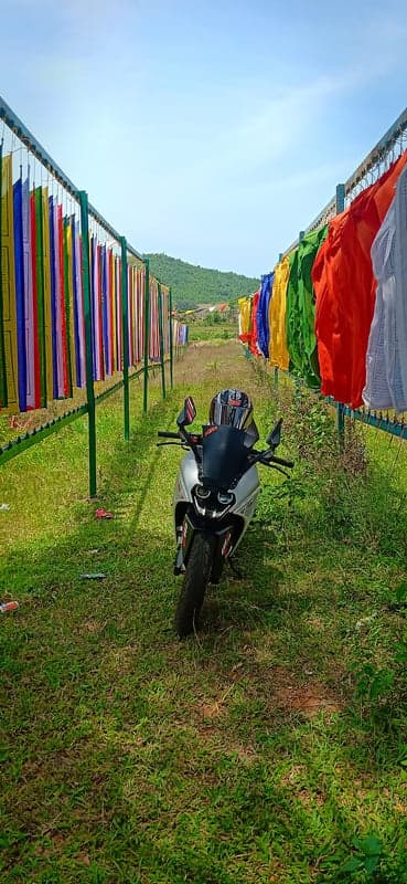 Adventure Motorcycle and Prayer Flags Mobile Wallpaper