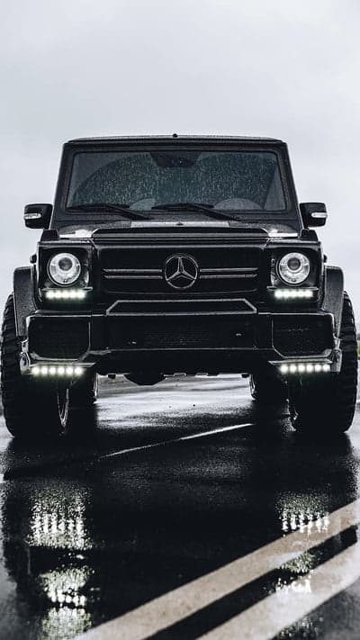 Black Mercedes G-Wagon on Wet Road