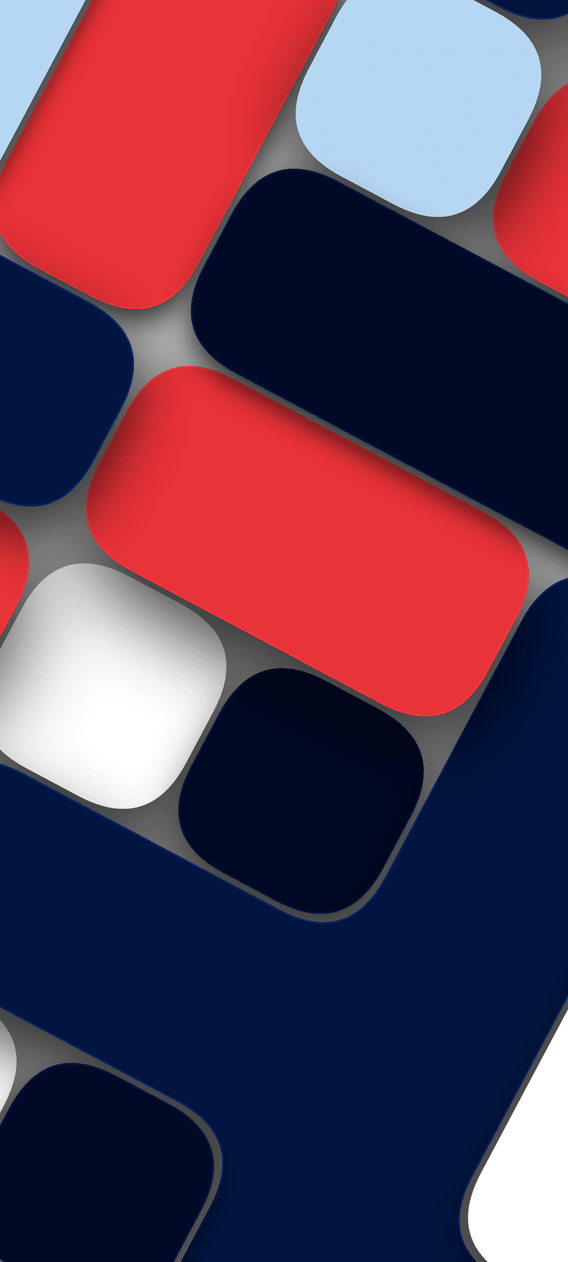 Rounded red and blue geometric shapes overlap on a textured grey surface with subtle 3D drop shadows.