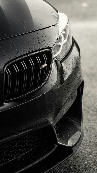 Dark BMW M Front Detail Wet Asphalt Mobile Wallpaper