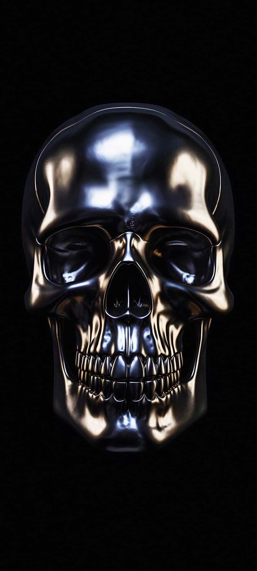 Polished chrome human skull with reflective surfaces and bright highlights positioned against a black background.