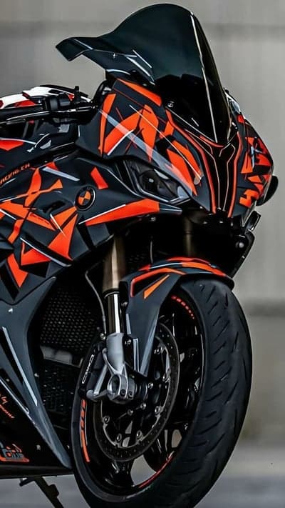 Aggressive BMW S1000RR Motorcycle with Orange and Black Graphics
