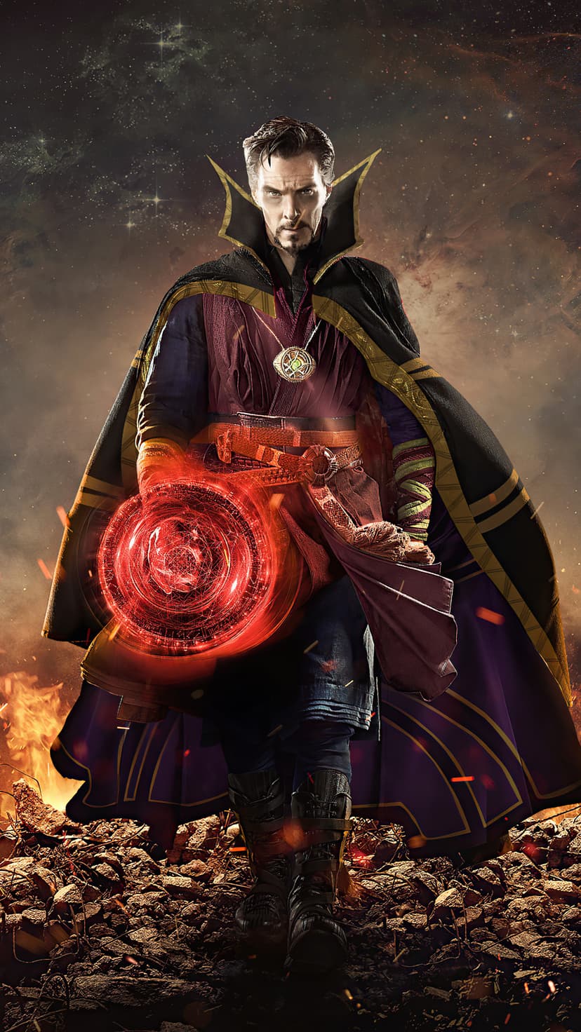 Doctor Strange stands in a red cloak holding glowing energy circles amidst smoke, fire, and falling rubble.