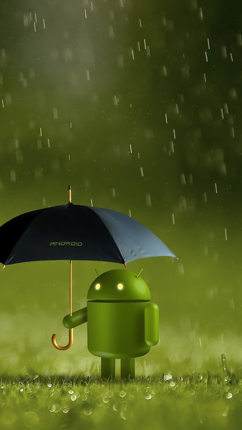 Android robot holds a black umbrella amid raindrops and wet grass in a lush green, out-of-focus field.