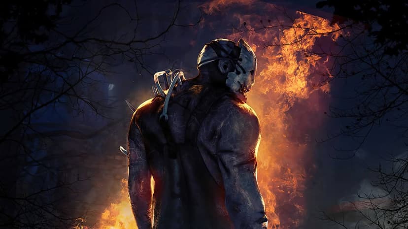 Masked killer from Dead by Daylight standing before intense orange flames and dark trees for desktop screens.