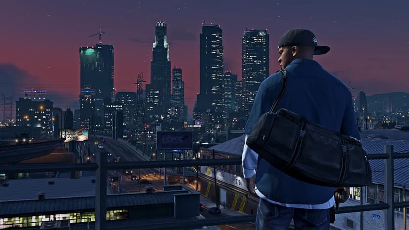 Franklin Clinton overlooks the illuminated Los Santos skyline at night with a duffel bag and city lights.