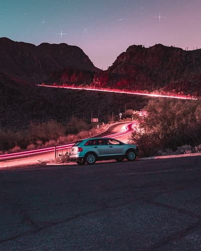 Twilight Desert Road Light Trails Smartphone Background