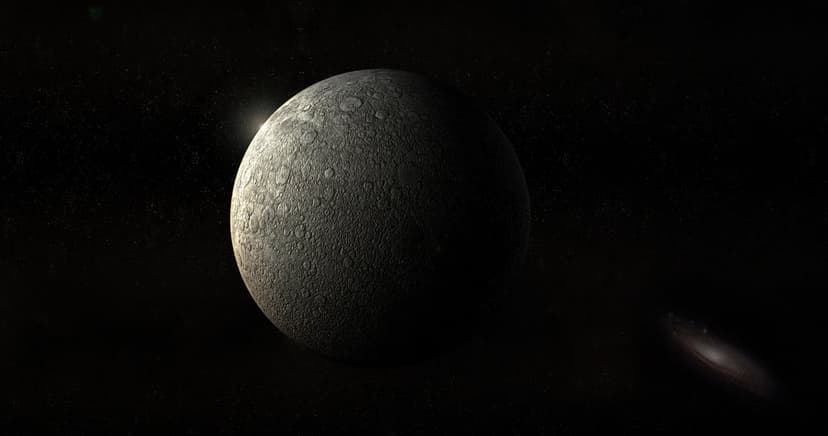 Mercury's cratered surface glows under starlight with a faint spiral galaxy visible against a black space backdrop.
