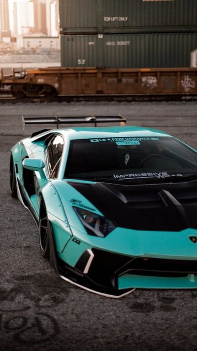 Custom Teal Lamborghini Aventador with Aggressive Aero Kit