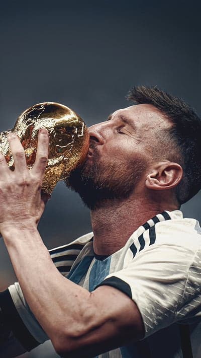Lionel Messi Kisses World Cup Trophy