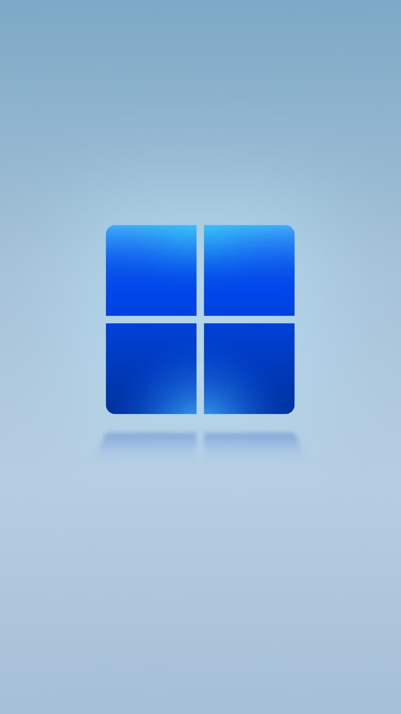 Windows 11 logo featuring four blue squares with white dividers centered over a soft blue gradient background.