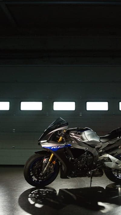 Yamaha R1 Motorcycle in Modern Garage with Dramatic Lighting
