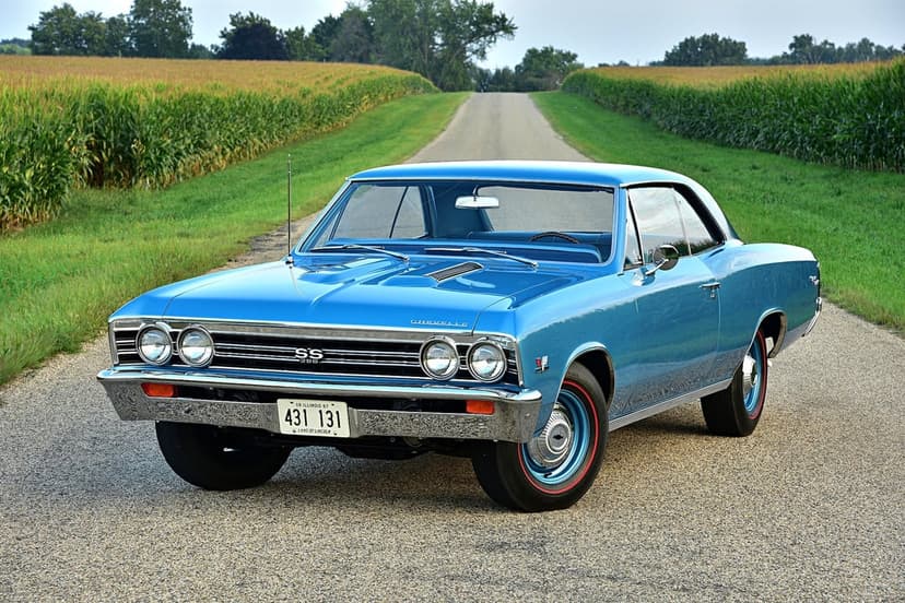 Blue 1967 Chevrolet Chevelle SS 396 parked on a rural road between cornfields under bright natural lighting.