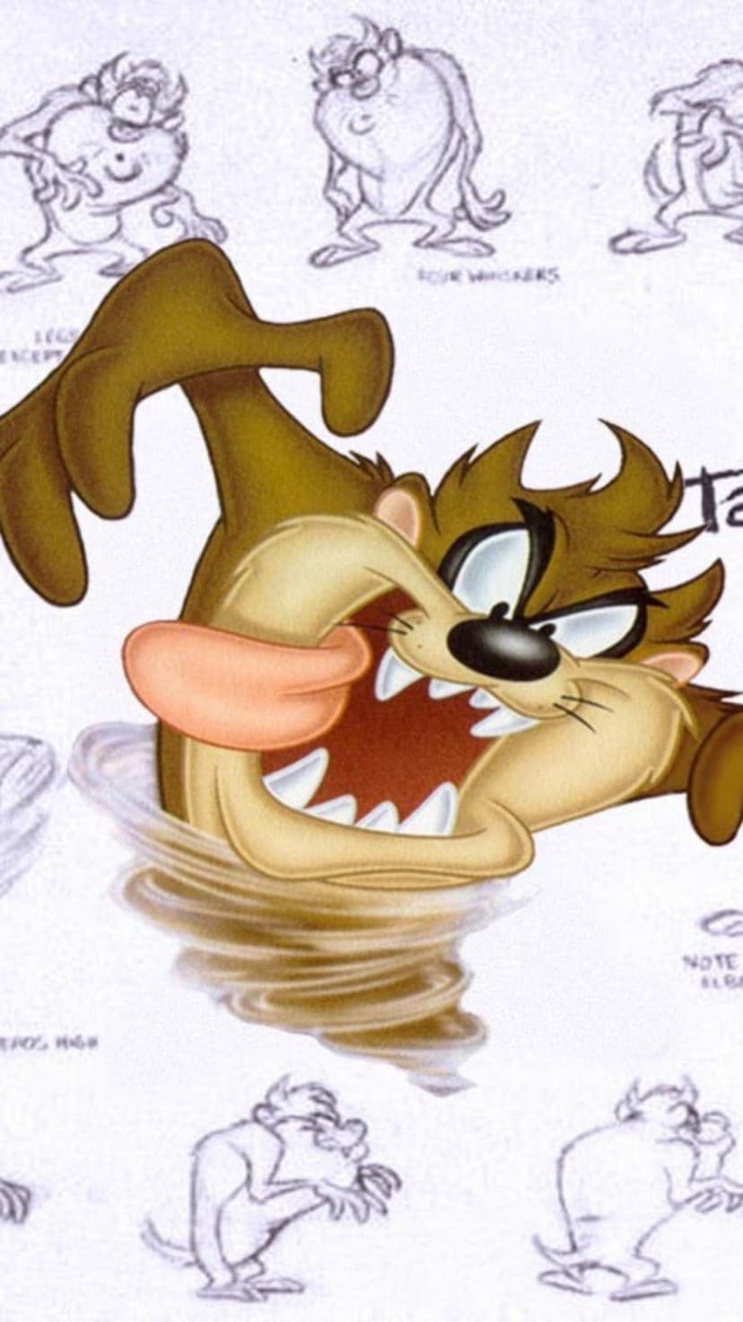 Taz the Tasmanian Devil spins in a brown tornado surrounded by rough pencil sketches and character studies.