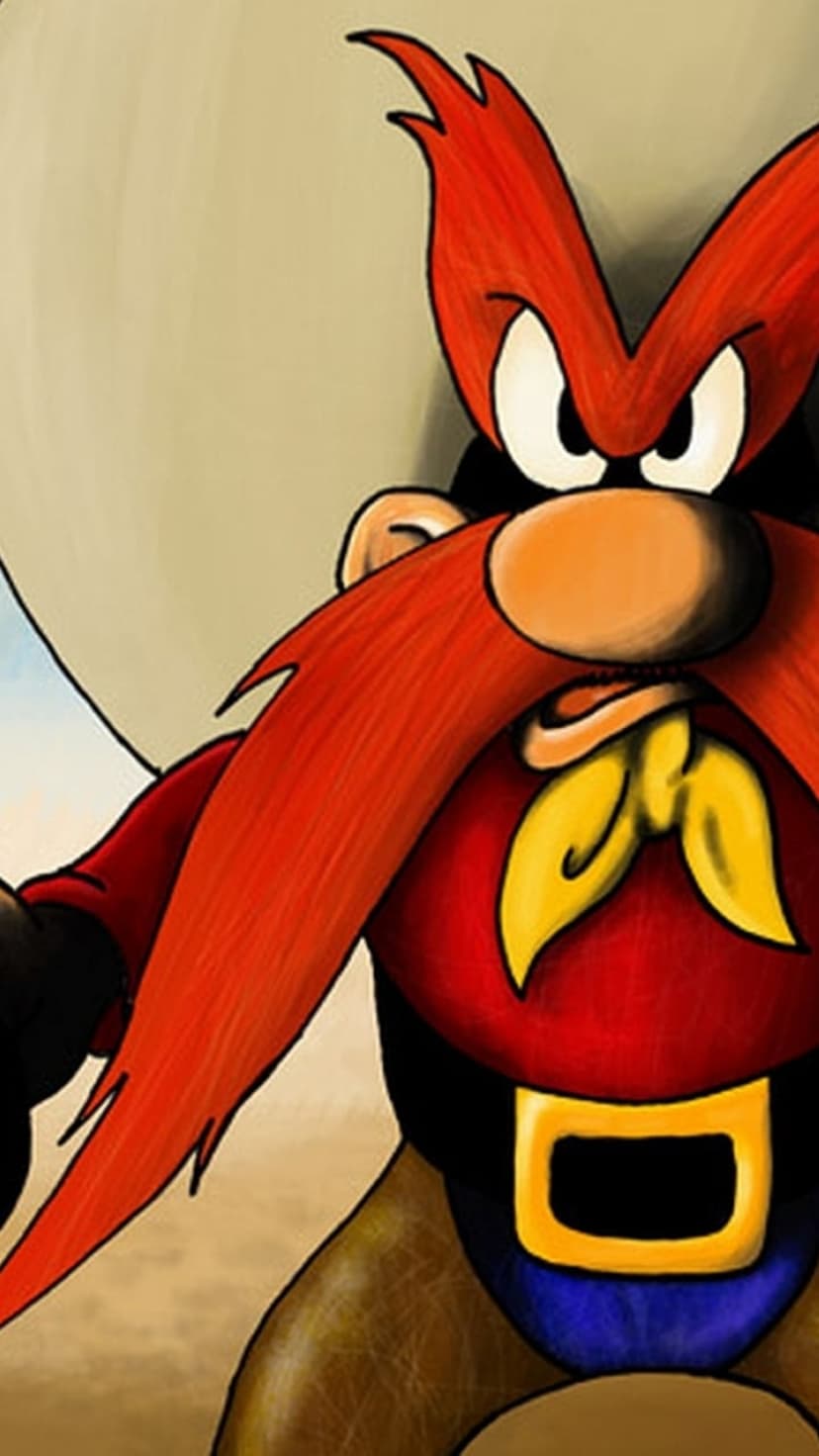 Yosemite Sam wears a large cowboy hat and red shirt with his signature long red mustache and yellow bandana.