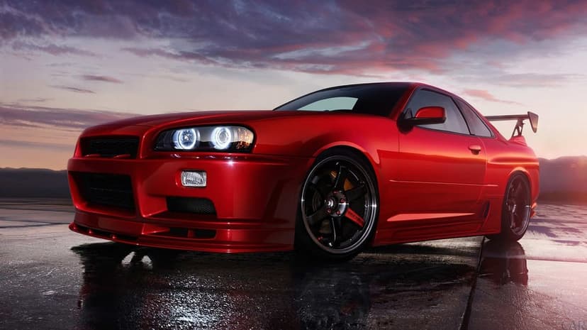 Red Nissan Skyline GT-R R34 on wet asphalt with glowing headlights under a vibrant purple and orange sunset sky.