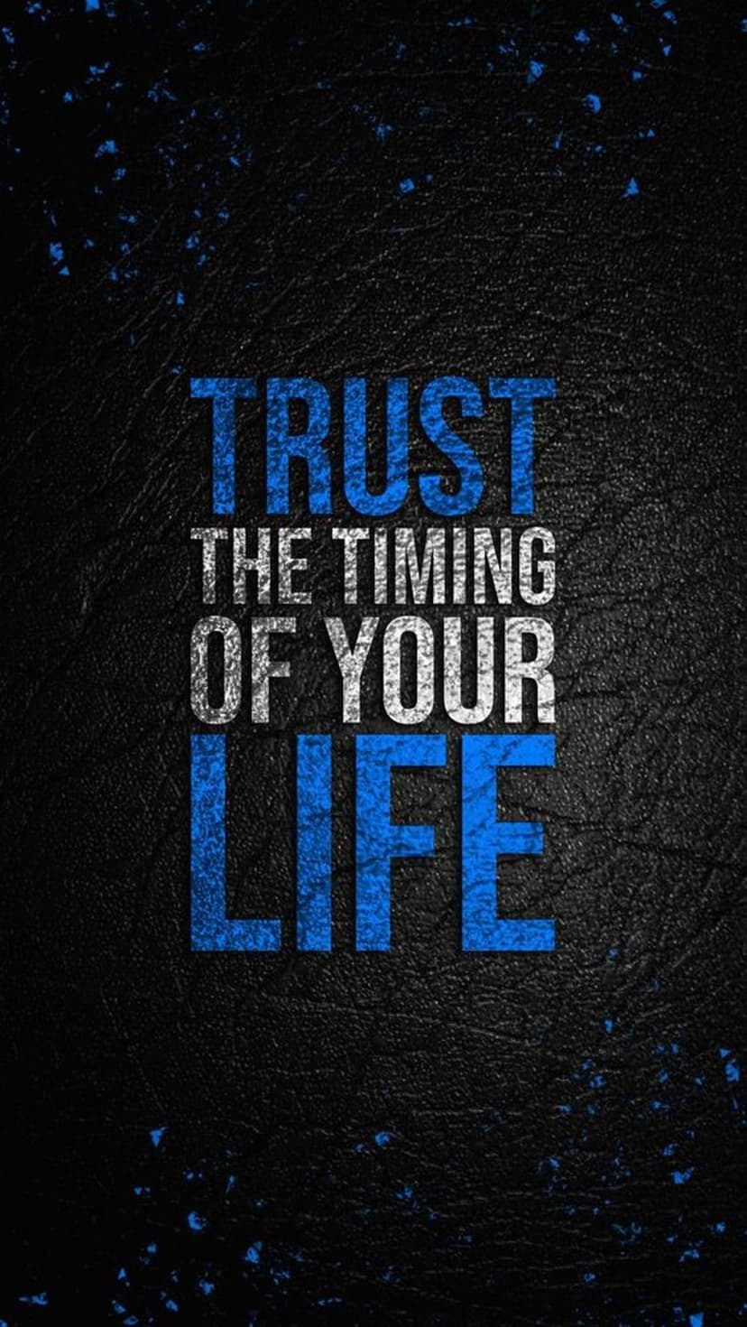 Trust the Timing of Your Life quote in blue and white lettering over a grainy black textured mobile background.