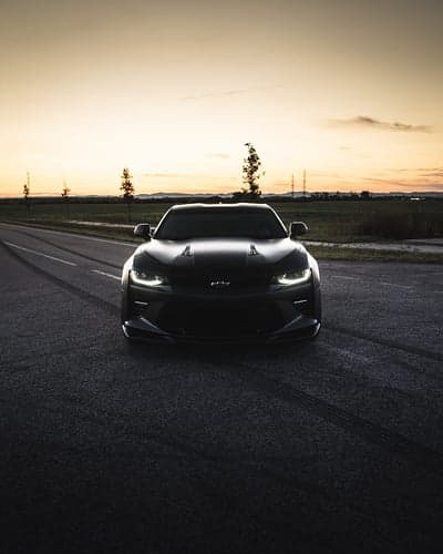 Stealthy Chevrolet Camaro Sunset Drive Mobile Wallpaper