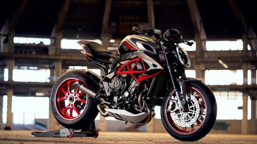 MV Agusta Dragster RC motorcycle with a red frame and wheels inside a sunlit industrial warehouse setting.