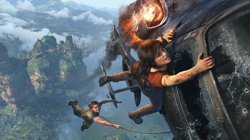Chloe Frazer clings to a burning helicopter while Nadine Ross hangs by a rope over a tropical jungle landscape.