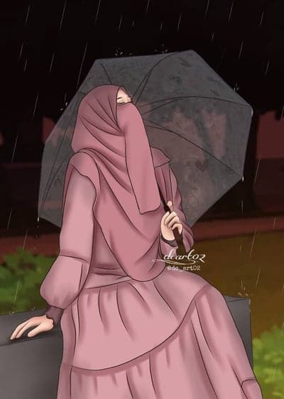Woman in Hijab with Umbrella in the Rain